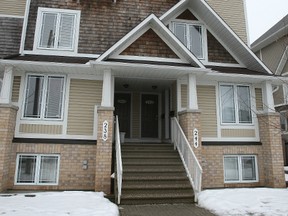 Two men were stabbed inside this multi-unit home at 242 Chapman Mills in Barrhaven early Dec. 24, police say. The wounds were not life threatening. (DOUG HEMPSTEAD Ottawa Sun)