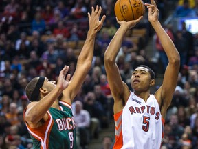 Toronto Raptors Bruno Caboclo and Milwaukee Bucks Jared Dudley at the Air Canada Centre in Toronto on Friday November 21, 2014. (Ernest Doroszuk/Toronto Sun)