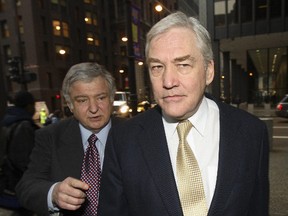 Conrad Black (R) arrives for a status hearing in federal court with his lawyer Edward Greenspan in Chicago January 12, 2007. (Toronto Sun files)
