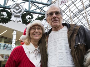 Shoppers Murry Epple (left) and David Kehler visited West Edmonton Mall to shop and get exercise while taking a break from Christmas celebrations with their family in Edmonton, Alta., on Thursday, Dec. 25, 2014. Some stores are open on Christmas Day in the large west Edmonton mall offering Boxing Day prices. Ian Kucerak/Edmonton Sun/ QMI Agency