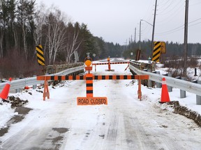 The bridge on Kalmo Road was closed at Main Street and Notre Dame in Val Caron because it was damaged as a result of heavy rain and rising water levels. 
JOHN LAPPA/THE SUDBURY STAR/QMI AGENCY