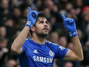 Chelsea's Diego Costa celebrates after scoring a goal against West Ham United during their English Premier League soccer match at Stamford Bridge in London, December 26, 2014. (REUTERS/Stefan Wermuth)