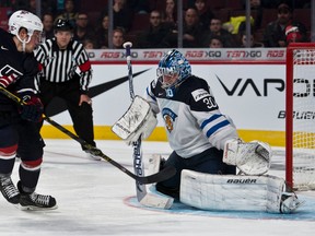 (18) Chase De Leo (F) scores against Ville Husso (G)  in the shootout of the game between team Finland and team USA at the 2015 IIHF World Junior Championship (Group A) at the Bell Center in Montreal on December 26th 2015. (MARTIN CHEVALIER/QMI AGENCY)