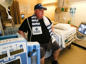 Rob Ford starts his second round of chemotherapy as he watches the Maple Leafs take on the Canadiens on TV from his Mount Sinai Hospital room on Wednesday, October 8, 2014. (Stan Behal/Toronto Sun)