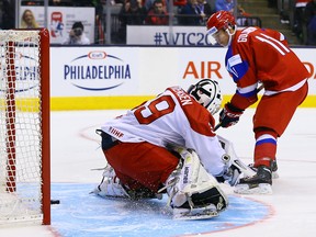 Russia's Nikolay Goldobin scores on Georg Sorensen of Denmark in a shootout to end a game at the 2015 World Junior Hockey Championships at the Air Canada Centre on December 26, 2014. (Dave Abel/QMI Agency)