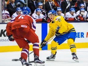 Sweden's William Nylander and Czech Republic's Lukas Klok during a IIHF World Junior Championship game at the Air Canada Centre in Toronto, Ont on December 26, 2014. (Ernest Doroszuk/Toronto Sun/QMI Agency)