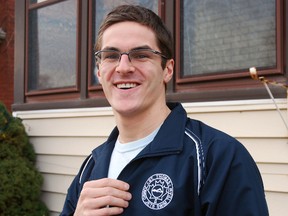 Gordie Michie stands outside his St. Thomas home, highlighting the crest of his St. Thomas Jumbo Jets swim team jacket. Michie posted a number of personal bests and top-three finishes at the recent CAN-AM Para-swimming championships in Edmonton.