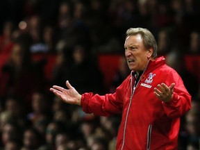 Crystal Palace manager Neil Warnock reacts during English Premier League play against Manchester United at Old Trafford in Manchester November 8, 2014. (REUTERS/Andrew Yates/Files)