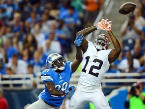 Detroit Lions cornerback Cassius Vaughn (29) knocks a pass away from Cleveland Browns wide receiver Josh Gordon (12) during the second quarter at Ford Field on Aug 9, 2014 in Detroit, MI, USA. (Andrew Weber/USA TODAY Sports)
