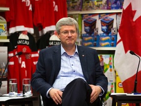 Prime Minister Stephen Harper. 

Canada's Prime Minister Stephen Harper participates in a roundtable discussion with the Retail Council of Canada in the back of a Canadian Tire retail store in Mississauga, December 11, 2014.    REUTERS/Mark Blinch