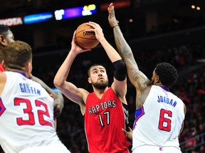 Raptors centre Jonas Valanciunas shoots over Clippers' DeAndre Jordan during Saturday's game in L.A. (USA TODAY SPORTS)