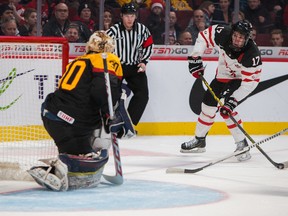 (17) Connor McDavid (F) carries the puck near Germany’s goaltender (30) Kevin Reich in the 1st period of the game between Team Canada and Team Germany during the 2015 IIHF World Junior Championship on December 27, 2014 at the Bell Centre in Montreal, QC. (JOHANY JUTRAS/QMI AGENCY)