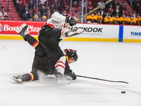 Canada's Darnell Nurse checks Germany's Marc Schmidpeter during the 2015 IIHF World Junior Championship on December 27, 2014 at the Bell Centre. (JOHANY JUTRAS/LE JOURNAL DE MONTRÉAL/QMI AGENCY)