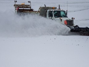 A Ledcor group snowplow clears Highway 43 in Woodlands County near Whitecourt during a snowfall on Dec. 21, 2014.

Adam Dietrich | Whitecourt Star