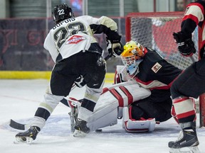 Tanner McCorriston, Whitecourt Wolverines goalie, makes a save during a game against the Bonnyville Pontiacs at the Scott Safety Centre on Friday December 19, 2014 in Whitecourt, Alta. The Pontiacs defeated the Wolverines 4-2. 

Adam Dietrich | Whitecourt Star