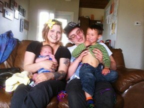 A photo of Roseann Deleeuw, 26, left, and Jeremy Grambo, 28, and their children Caine and Kage, taken from the GoFundMePage which was created to raise money for a trust fund for the two children after Roseann and Jeremy died in a house fire in north Edmonton on Dec. 21. PHOTO SUPPLIED