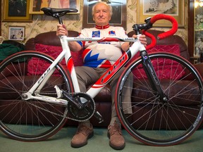 John Craig opened the first modern bicycle store in London in 1967. Craig is seen here at home, with his son?s track bike. His whole family worked in his bike shop, including his six children.  (Mike Hensen, The London Free Press)