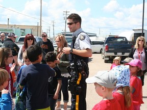 Drayton Valley RCMP hosted an Open House during the summer months early this year. Children and adults were seen along with emergency services enjoying a sunny afternoon with buns and dogs.