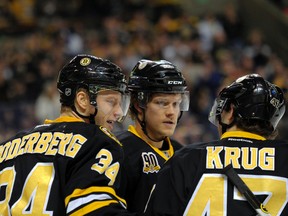 Then-Boston Bruins defenseman Matt Fraser (centre), picked up on waivers by the Edmonton Oilers Dec. 29, 2014, celebrates during the second period at TD Banknorth Garden, Jan. 4, 2014. (Bob DeChiara-USA TODAY Sports)