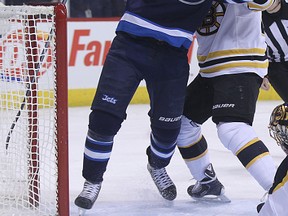 Winnipeg Jets forward Evander Kane, seen here earlier this month in a game in Boston, was injured in Saturday's game in St. Paul and will be out of the lineup until February. (Kevin King/Winnipeg Sun file photo)