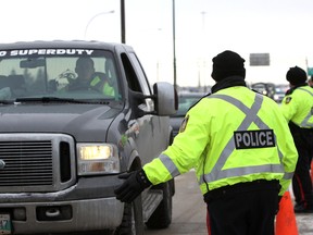 The Winnipeg Police Service and the RCMP conduct a Checkstop along Highway 59 in East St. Paul earlier this month. (Brook Jones/QMI Agency file photo)