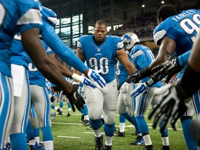 Detroit Lions defensive tackle Ndamukong Suh (90) is introduced prior to their game against the Jacksonville Jaguars at Ford Field. (Tim Fuller/USA TODAY Sports)