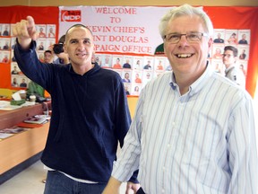 Manitoba NDP leader Greg Selinger (right) tours the Point Douglas constituency office with Kevin Chief in 2011. (BRIAN DONOGH/WINNIPEG SUN FILE PHOTO)
