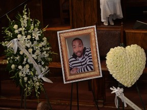 Mourners at the funeral service of Ezell Ford, 25, who was shot by police on August 11 after allegedly struggling with two officers in South Los Angeles, at the First AME Church in Los Angeles on August 30, 2014.              AFP PHOTO/Mark RALSTON