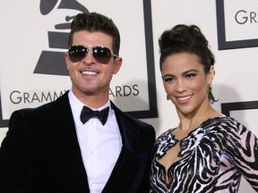 Robin Thicke and Paula Patton. 

WENN