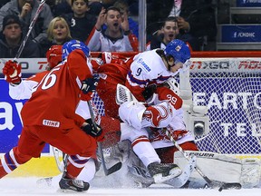 George Sorensen of Denmark is run over by David Pastrnak of the Czech Republic during the 2015 World Junior Championship at the Air Canada Centre in Toronto on Monday December 29, 2014. (Dave Abel/Toronto Sun/QMI Agency)