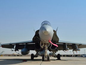 A Royal Canadian Armed Forces CF-18 Hornet fighter jet from 4 Wing Cold Lake, Alberta parked at the Canadian Air Task Force apron in Kuwait. (Canadian Forces Combat Camera, DND)