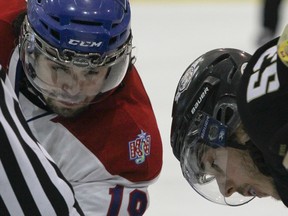 Kingston Voyageurs’ Adam Brady, left, has achieved his goal of earning an NCAA hockey scholarship. (Whig-Standard file photo)