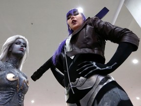 Participants dressed in costumes pose for a photograph at Comic-Con Russia convention and IgroMir 2014 exhibition in Moscow in October. (Sergei Karpukhin/Reuters)