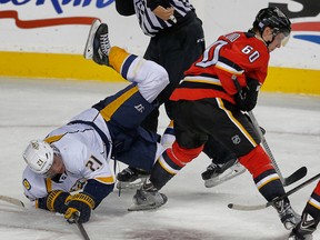 Derek Roy, shown here in a collision with Calgary's Markus Granlund, is headed to Edmonton while Mark Arcobello is headed to Nashville (Al Charest, QMI Agency).