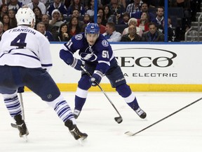 Lightning forward Valtteri Filppula passes the puck as Maple Leafs’ Cody Franson backpedals on Monday night in Tampa. (USA TODAY SPORTS/PHOTO)