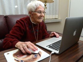 Senior on computer