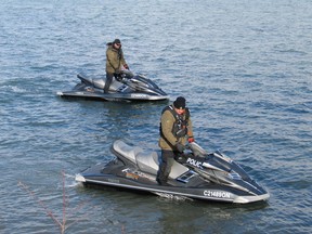 The Niagara Regional Police marine unit assists with a shoreline search for Alexander Fraser Tuesday, Dec. 30, 2014. The Niagara Falls man's car was found destroyed by fire on Friday, Dec. 26, 2014. (HARRY ROSETTANI/Special to QMI Agency Niagara)