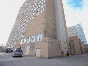 One of the victims was walking near this building at 350 Queen's Quay W. when she was attacked. (ERNEST DOROSZUK/Toronto Sun)