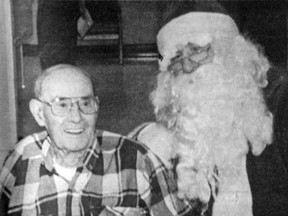 Dec. 21, 1994 Advocate file photo
Champion’s Shorty Harris has a fun time with Santa during a visit at the Peter Dawson Lodge.