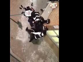 A screengrab from a video which appears to show security guards kicking a suspect outside the Bramalea City Centre.