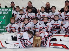 The Ingersoll Express celebrate their B championship at the atom regional Silver Stick tournament in Alvinston Tuesday night. The Express defeated the Lambeth Lancers 9-2 in the B final at the 25th annual tournament. (TERRY BRIDGE/THE OBSERVER)