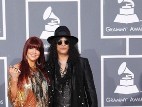Slash with wife Perla Ferrar. (Reuters files)