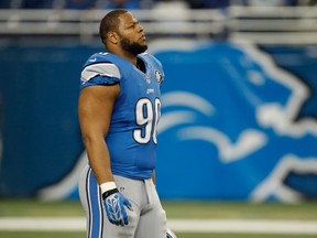 Ndamukong Suh #90 of the Detroit Lions participates in pregame warm ups prior to the game against the Minnesota Vikings at Ford Field on December 14, 2014 in Detroit, Michigan. (Gregory Shamus/Getty Images/AFP)