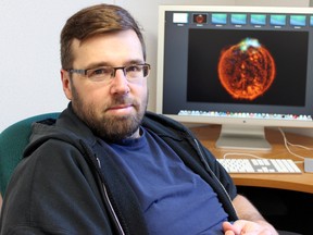 Dr. Gregg Wade, professor of physics with a focus on magnetic fields in stars at the Royal Military College, said Wednesday the information NASA's NuSTAR satellite sends back to earth benefits local astronomy students. (STEPH CROSIER/ THE KINGSTON WHIG-STANDARD)
