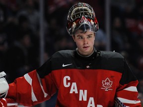 Eric Comrie takes a breather during the second period against the U.S. at the 2015 World Junior Championship in Montreal on Wednesday, Dec. 31, 2014. (Martin Chevalier/QMI Agency)