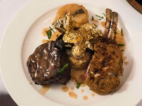 A plate of wagyu beef, aged lamb, and 24 karat gold leaf chanterelle risotto, which was featured on New York's  Nino's Ristorante's New Year's Eve menu. (REUTERS)