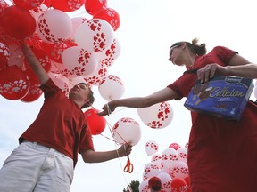 The Canada Day Red and White Parade, (ELLIOT FERGUSON/The Whig-Standard)