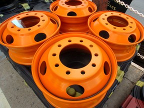 Freshly manufactured wheels waiting to be shipped out from the inventory yard at Accuride. (Free Press file photo)