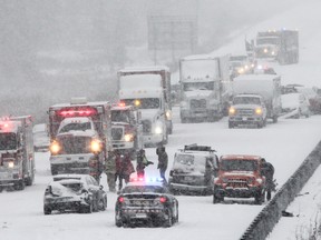 Sudden snow squalls are being blamed for a series of New Year's Day collisions that closed the eastbound lane of Hwy. 401 for three hours through the Kingston corridor on Thursday. Ontario Provincial Police reported only minor injuries despite all of the crashes. (Julia McKay/The  Whig-Standard)