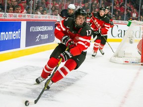 Team Canada forward Connor McDavid skates with the puck against the U.S. during the World Junior Hockey Championship at the Bell Centre in Montreal, Dec. 31, 2014. (JOHANY JUTRAS/QMI Agency)